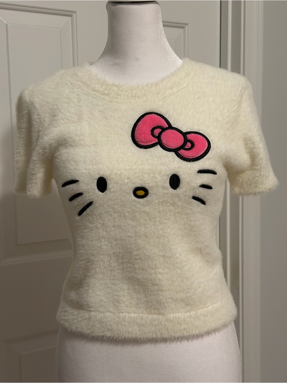Hello Kitty Cream Fuzzy Short-Sleeve Sweater with Pink Bow in Small